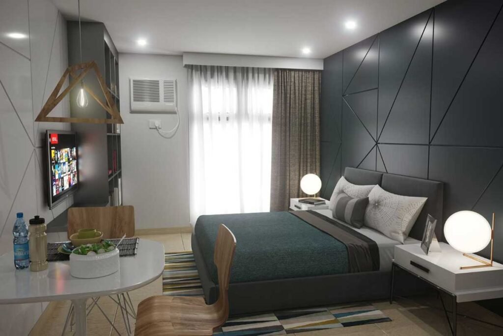 Cozy studio bedroom interior at Cirrus Condo in Pasig by RLC Residences featuring modern decor and dining area