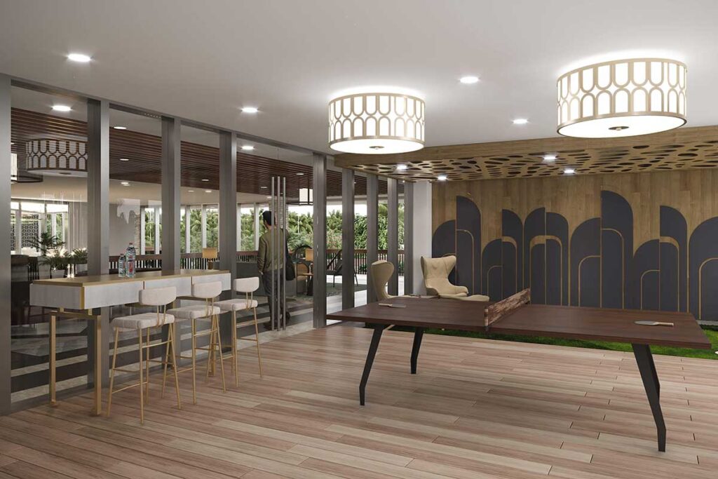 Stylish indoor lounge and game room at Sierra Valley Gardens with ping pong table and bar seating