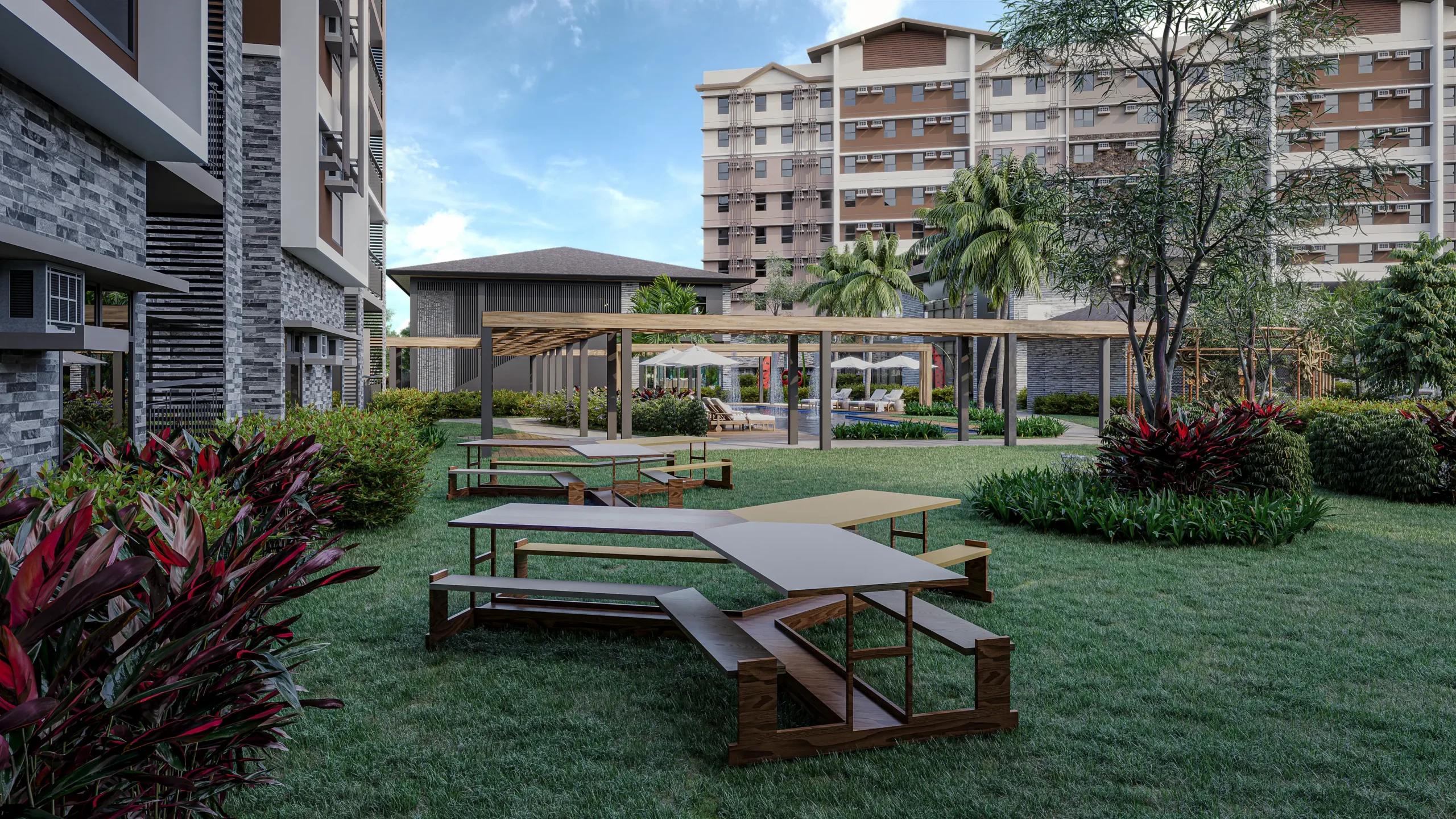 Garden area with modern picnic benches and pergola at Woodsville Crest Residences